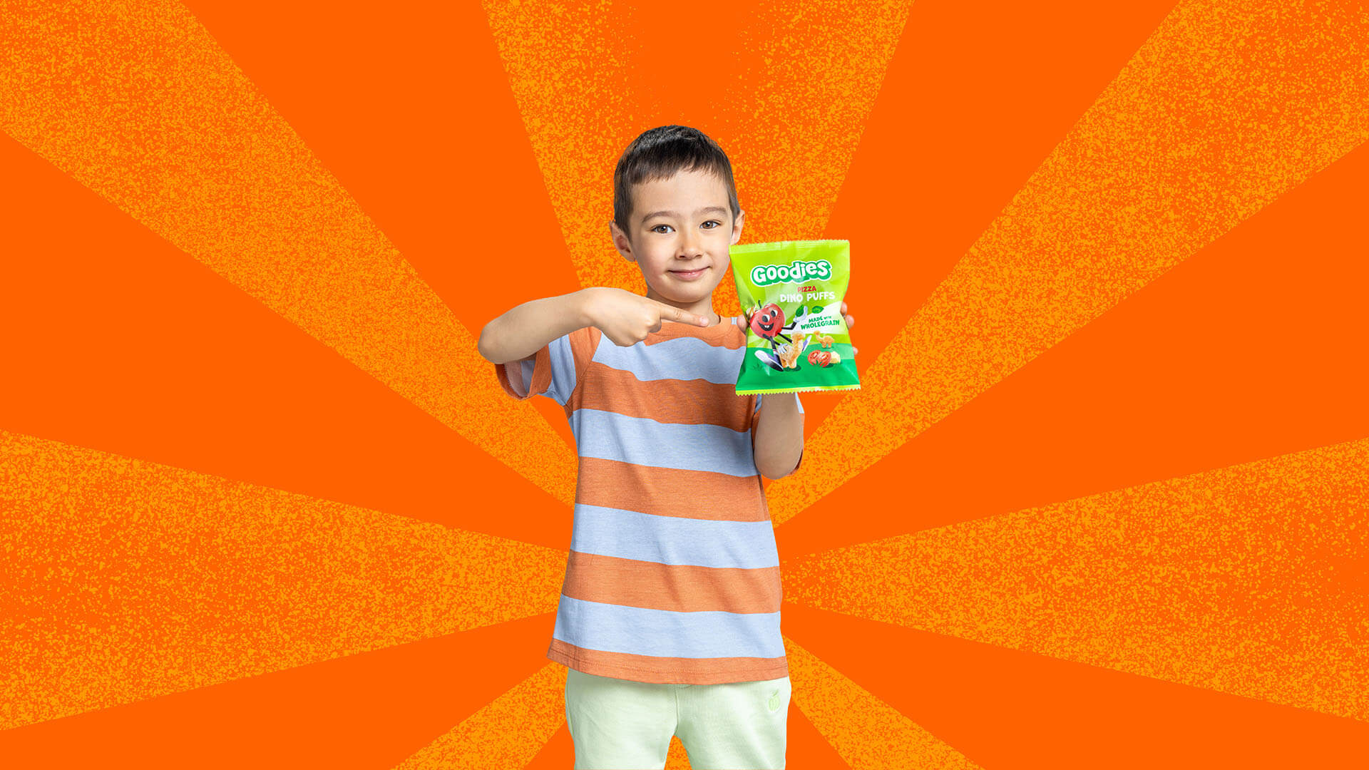Child holding Goodies Snack Pack