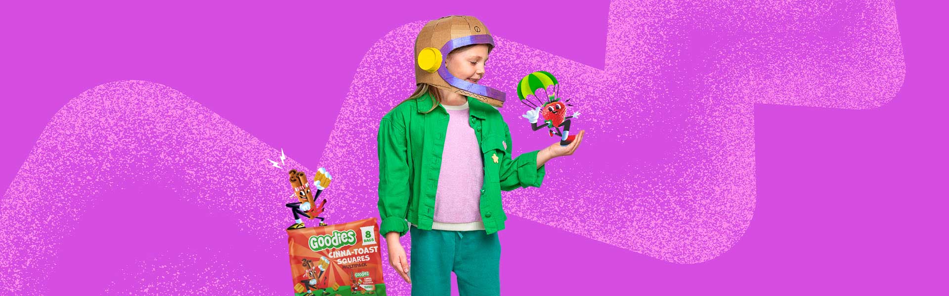 Girl wearing space helmet looking at Goodies characters