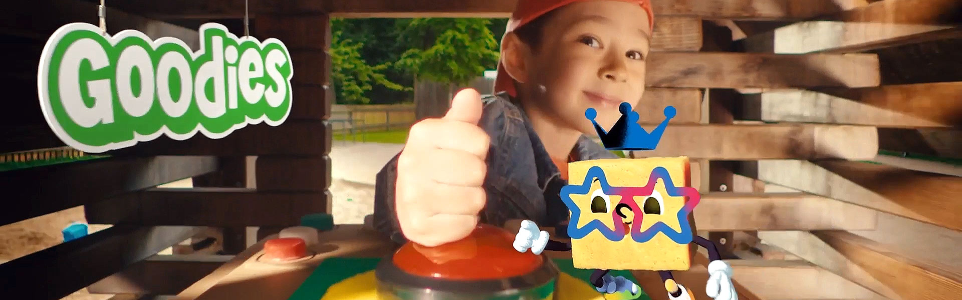 Boy hitting a button with Cheese character